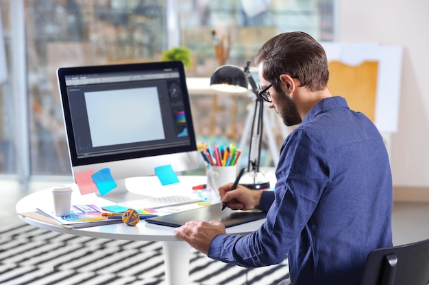 modern-designer-working-with-graphic-tablet_392895-234948 modern-designer-working-with-graphic-tablet_392895-234948
